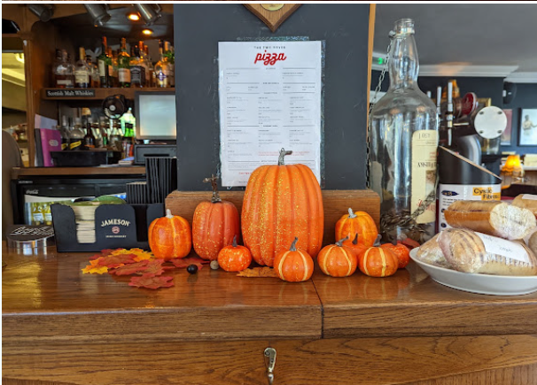 Seasonal pumpkin display on the bar